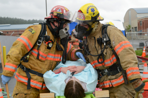 Firefighters Decontaminate and triage victims